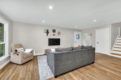 At first glance, this brick and sided split-level home may on Ravisloe Country Club in Illinois - for sale on GolfHomes.com, golf home, golf lot