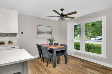 At first glance, this brick and sided split-level home may on Ravisloe Country Club in Illinois - for sale on GolfHomes.com, golf home, golf lot
