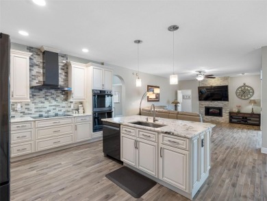 Welcome home to this beautifully UPDATED EXECUTIVE POOL HOME, in on Countryway Golf Course in Florida - for sale on GolfHomes.com, golf home, golf lot