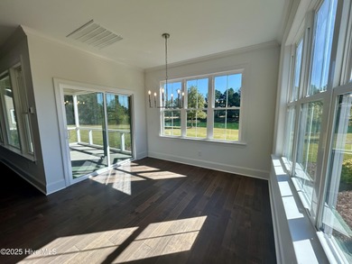 Modern Farmhouse Living Meets Coastal ConvenienceThis modern on River Landing Golf Course in North Carolina - for sale on GolfHomes.com, golf home, golf lot