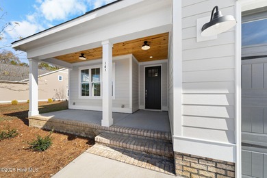 Modern Farmhouse Living Meets Coastal Convenience. A must see on River Landing Golf Course in North Carolina - for sale on GolfHomes.com, golf home, golf lot