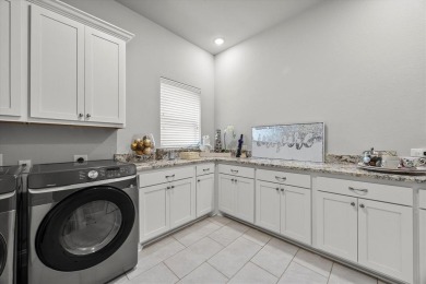 Former model home on a premium corner lot in the highly on Heath Golf and Yacht Club in Texas - for sale on GolfHomes.com, golf home, golf lot