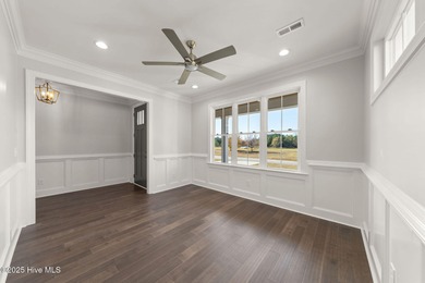 Modern Farmhouse Living Meets Coastal Convenience. A must see on River Landing Golf Course in North Carolina - for sale on GolfHomes.com, golf home, golf lot