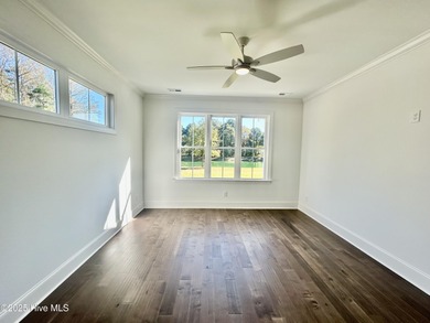 Modern Farmhouse Living Meets Coastal ConvenienceThis modern on River Landing Golf Course in North Carolina - for sale on GolfHomes.com, golf home, golf lot