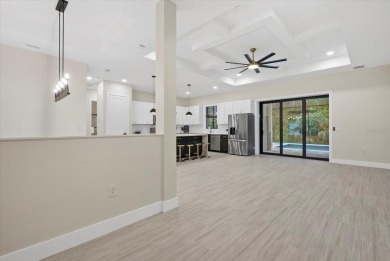 Welcome to your dream Florida oasis! This stunning newly built on Sabal Trace Golf and Country Club in Florida - for sale on GolfHomes.com, golf home, golf lot