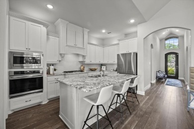 Former model home on a premium corner lot in the highly on Heath Golf and Yacht Club in Texas - for sale on GolfHomes.com, golf home, golf lot