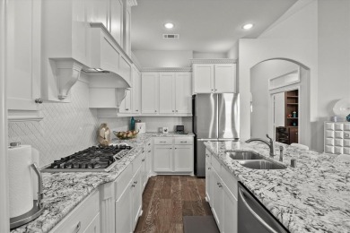 Former model home on a premium corner lot in the highly on Heath Golf and Yacht Club in Texas - for sale on GolfHomes.com, golf home, golf lot