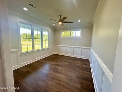 Modern Farmhouse Living Meets Coastal ConvenienceThis modern on River Landing Golf Course in North Carolina - for sale on GolfHomes.com, golf home, golf lot