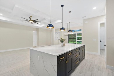 Welcome to your dream Florida oasis! This stunning newly built on Sabal Trace Golf and Country Club in Florida - for sale on GolfHomes.com, golf home, golf lot