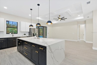 Welcome to your dream Florida oasis! This stunning newly built on Sabal Trace Golf and Country Club in Florida - for sale on GolfHomes.com, golf home, golf lot