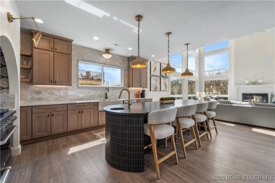 This stunning 5,500 sq ft home offers an exceptional blend of on The Club At Porto Cima in Missouri - for sale on GolfHomes.com, golf home, golf lot