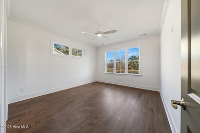 Modern Farmhouse Living Meets Coastal Convenience. A must see on River Landing Golf Course in North Carolina - for sale on GolfHomes.com, golf home, golf lot