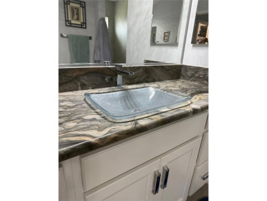 ~WATER VIEW~ ~POOL  SPA HOME~ ~2020 ROOF~ ~GC GARAGE~ ~SOLAR on Pennbrooke Fairways in Florida - for sale on GolfHomes.com, golf home, golf lot