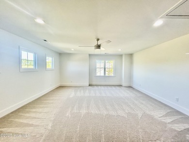 Modern Farmhouse Living Meets Coastal ConvenienceThis modern on River Landing Golf Course in North Carolina - for sale on GolfHomes.com, golf home, golf lot