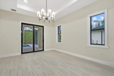 Welcome to your dream Florida oasis! This stunning newly built on Sabal Trace Golf and Country Club in Florida - for sale on GolfHomes.com, golf home, golf lot