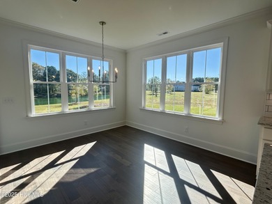 Modern Farmhouse Living Meets Coastal ConvenienceThis modern on River Landing Golf Course in North Carolina - for sale on GolfHomes.com, golf home, golf lot