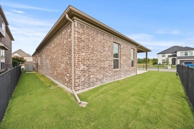 Former model home on a premium corner lot in the highly on Heath Golf and Yacht Club in Texas - for sale on GolfHomes.com, golf home, golf lot