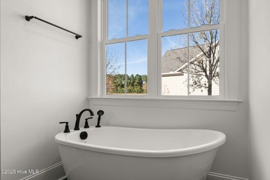 Modern Farmhouse Living Meets Coastal Convenience. A must see on River Landing Golf Course in North Carolina - for sale on GolfHomes.com, golf home, golf lot