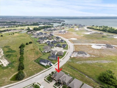 Former model home on a premium corner lot in the highly on Heath Golf and Yacht Club in Texas - for sale on GolfHomes.com, golf home, golf lot