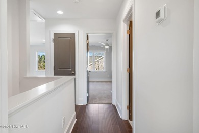 Modern Farmhouse Living Meets Coastal Convenience. A must see on River Landing Golf Course in North Carolina - for sale on GolfHomes.com, golf home, golf lot