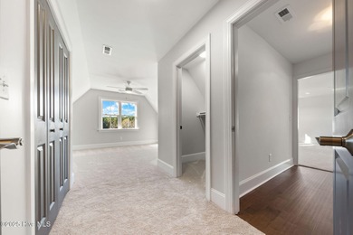 Modern Farmhouse Living Meets Coastal Convenience. A must see on River Landing Golf Course in North Carolina - for sale on GolfHomes.com, golf home, golf lot