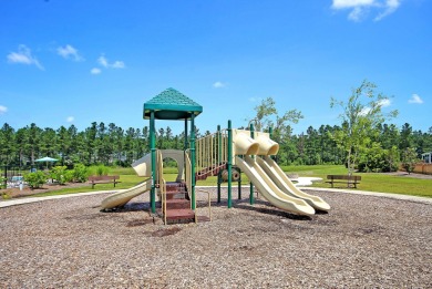 This stunning 5-bedroom, 4.5-bath home in The Oaks at Cane Bay on Cypress Point Par 3 in South Carolina - for sale on GolfHomes.com, golf home, golf lot