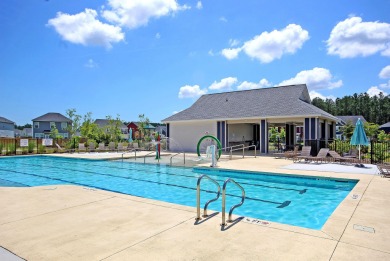 This stunning 5-bedroom, 4.5-bath home in The Oaks at Cane Bay on Cypress Point Par 3 in South Carolina - for sale on GolfHomes.com, golf home, golf lot