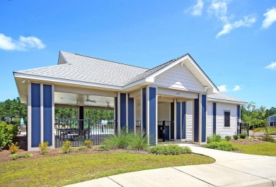 This stunning 5-bedroom, 4.5-bath home in The Oaks at Cane Bay on Cypress Point Par 3 in South Carolina - for sale on GolfHomes.com, golf home, golf lot