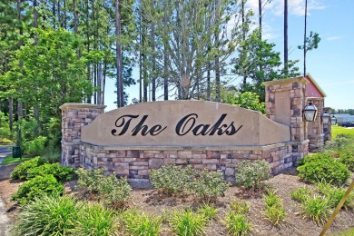 This stunning 5-bedroom, 4.5-bath home in The Oaks at Cane Bay on Cypress Point Par 3 in South Carolina - for sale on GolfHomes.com, golf home, golf lot