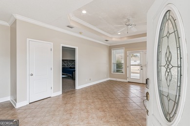 This charming duplex home for sale offers excellent curb appeal on Laurel Island Links in Georgia - for sale on GolfHomes.com, golf home, golf lot