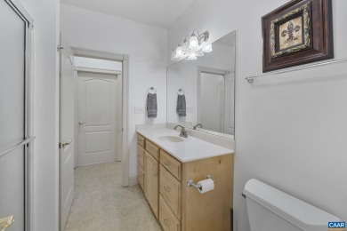 Nestled on a serene half-acre flat lot that backs to peaceful on Lake Monticello Golf Course in Virginia - for sale on GolfHomes.com, golf home, golf lot