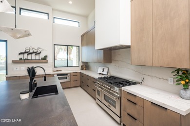Modern Luxury in Residential Estates! This stunning contemporary on London Bridge Golf Course in Arizona - for sale on GolfHomes.com, golf home, golf lot