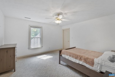 Nestled on a serene half-acre flat lot that backs to peaceful on Lake Monticello Golf Course in Virginia - for sale on GolfHomes.com, golf home, golf lot