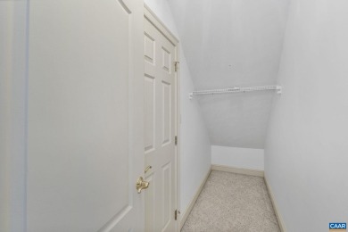 Nestled on a serene half-acre flat lot that backs to peaceful on Lake Monticello Golf Course in Virginia - for sale on GolfHomes.com, golf home, golf lot