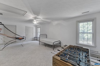 Nestled on a serene half-acre flat lot that backs to peaceful on Lake Monticello Golf Course in Virginia - for sale on GolfHomes.com, golf home, golf lot