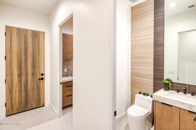 Modern Luxury in Residential Estates! This stunning contemporary on London Bridge Golf Course in Arizona - for sale on GolfHomes.com, golf home, golf lot