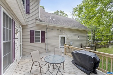 Nestled on a serene half-acre flat lot that backs to peaceful on Lake Monticello Golf Course in Virginia - for sale on GolfHomes.com, golf home, golf lot