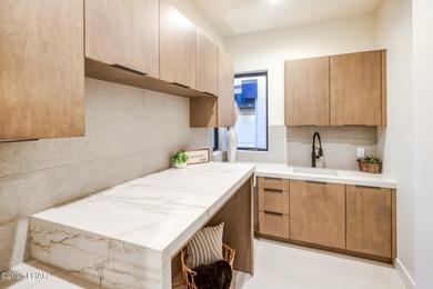 Modern Luxury in Residential Estates! This stunning contemporary on London Bridge Golf Course in Arizona - for sale on GolfHomes.com, golf home, golf lot