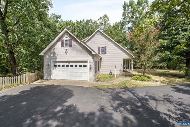 Nestled on a serene half-acre flat lot that backs to peaceful on Lake Monticello Golf Course in Virginia - for sale on GolfHomes.com, golf home, golf lot