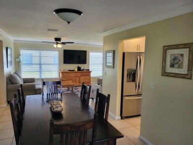 Welcome to Mainlands, an active 55+ golf cart-friendly community on Mainlands Golf Club in Florida - for sale on GolfHomes.com, golf home, golf lot
