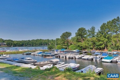 Nestled on a serene half-acre flat lot that backs to peaceful on Lake Monticello Golf Course in Virginia - for sale on GolfHomes.com, golf home, golf lot
