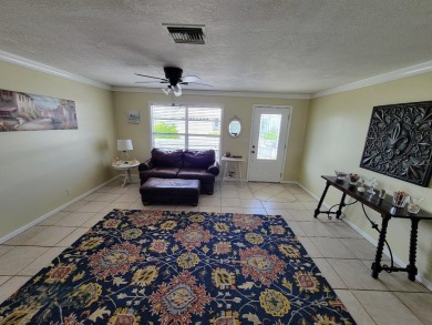 Welcome to Mainlands, an active 55+ golf cart-friendly community on Mainlands Golf Club in Florida - for sale on GolfHomes.com, golf home, golf lot