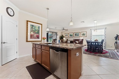 Beautifully upgraded Trevi floor plan located on a peaceful on River Strand Golf and Country Club At Heritage Harbour  in Florida - for sale on GolfHomes.com, golf home, golf lot