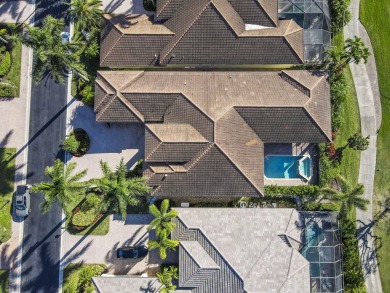 This very rare, 5 bedroom, Tuscany model is an elegant home on Ibis Golf and Country Club in Florida - for sale on GolfHomes.com, golf home, golf lot