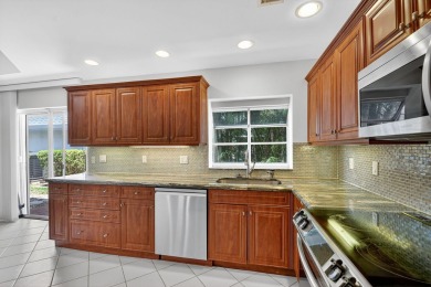 STEP INTO THIS 2/2/1-CG 1ST FLOOR CONDO &, YOU'LL LOVE THE on Indian Spring Golf and Country Club in Florida - for sale on GolfHomes.com, golf home, golf lot