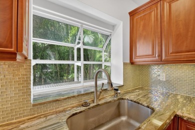 STEP INTO THIS 2/2/1-CG 1ST FLOOR CONDO &, YOU'LL LOVE THE on Indian Spring Golf and Country Club in Florida - for sale on GolfHomes.com, golf home, golf lot