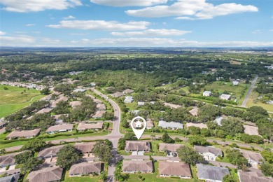 Short Sale. Enjoy carefree Florida living in this beautifully on Falcon Watch Golf Club in Florida - for sale on GolfHomes.com, golf home, golf lot