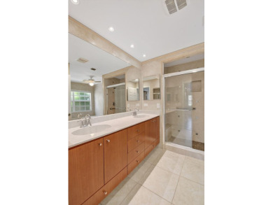 STEP INTO THIS 2/2/1-CG 1ST FLOOR CONDO &, YOU'LL LOVE THE on Indian Spring Golf and Country Club in Florida - for sale on GolfHomes.com, golf home, golf lot