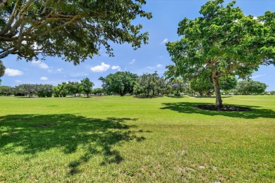 STEP INTO THIS 2/2/1-CG 1ST FLOOR CONDO &, YOU'LL LOVE THE on Indian Spring Golf and Country Club in Florida - for sale on GolfHomes.com, golf home, golf lot