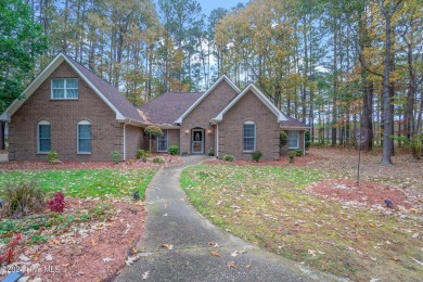 Immaculate, custom build, home in the gated, waterfront, golf on Sound Golf Links at Albemarle Plantation in North Carolina - for sale on GolfHomes.com, golf home, golf lot